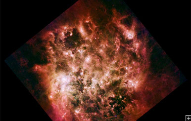 Image de Grand Nuage de Magellan dans l'infrarouge moyen a partir des données Spitzer.  Crédit : NASA Spitzer – SAGE team